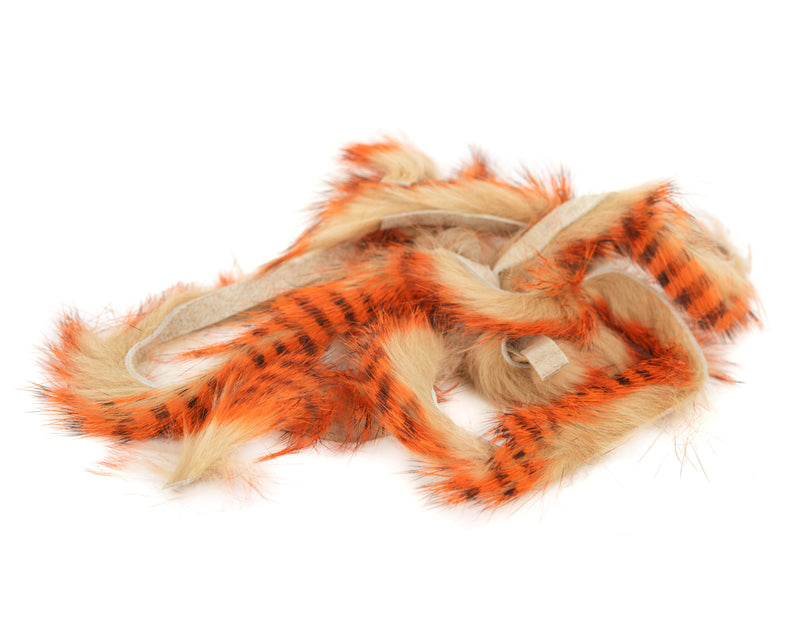 hareline MG barred rabbit zonker strips black orange tan